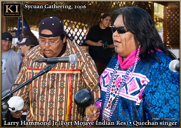 Yuman cultural sIngers shaking gourd rattles